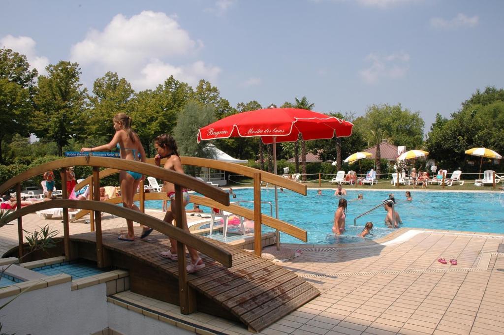 Villaggio Los Nidos Lignano Sabbiadoro Szoba fotó